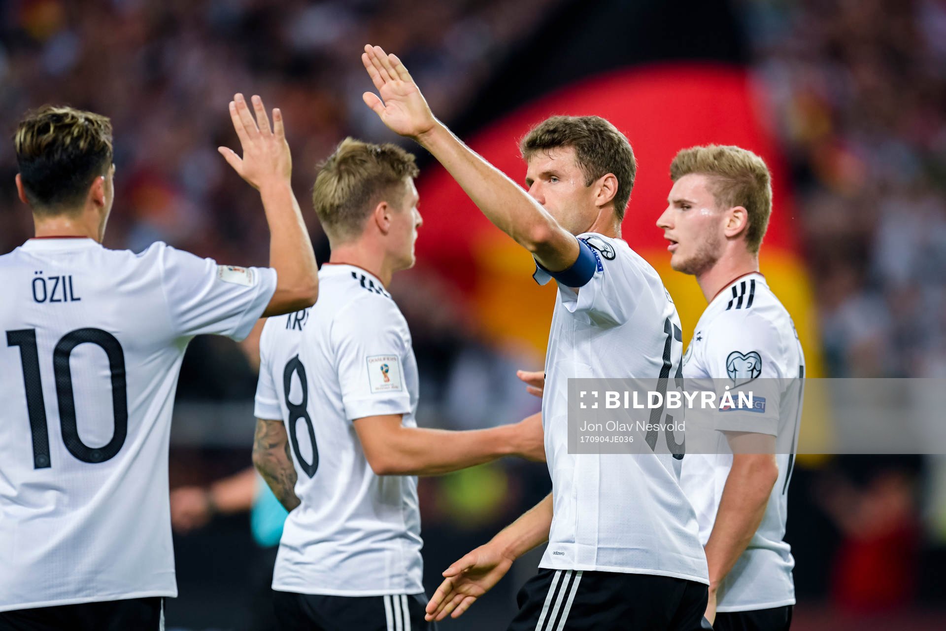 Mesut Özil, Toni Kroos and Thomas Müller of Germany