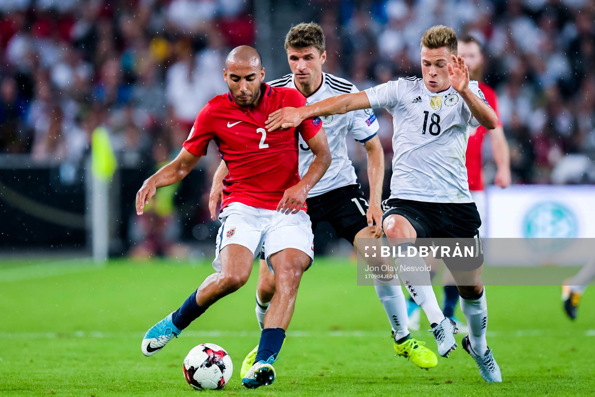 Haitam Aleesami of Norway and Joshua Kimmich of Germany