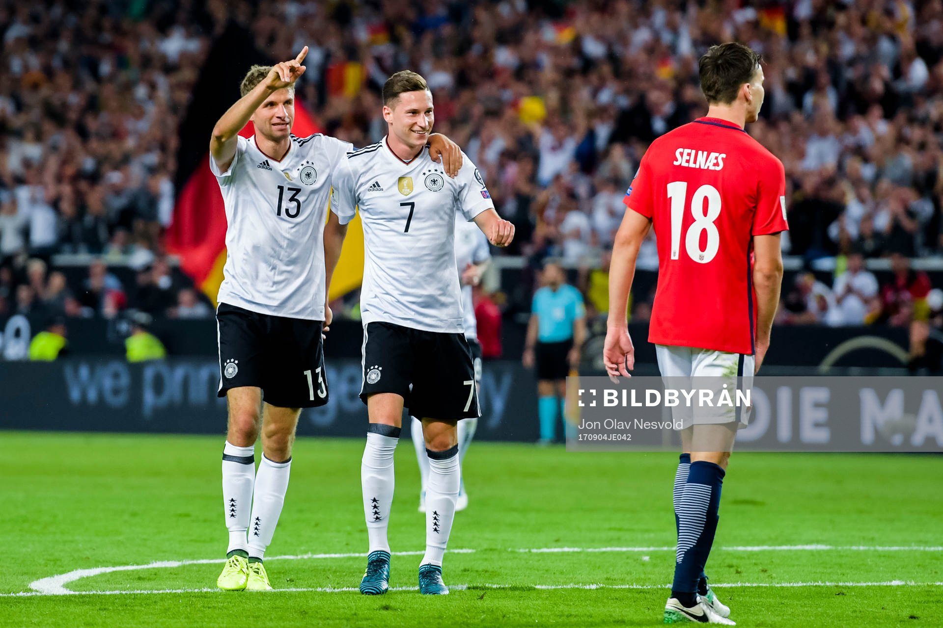 Thomas Müller and Julian Draxler of Germany celebrates the