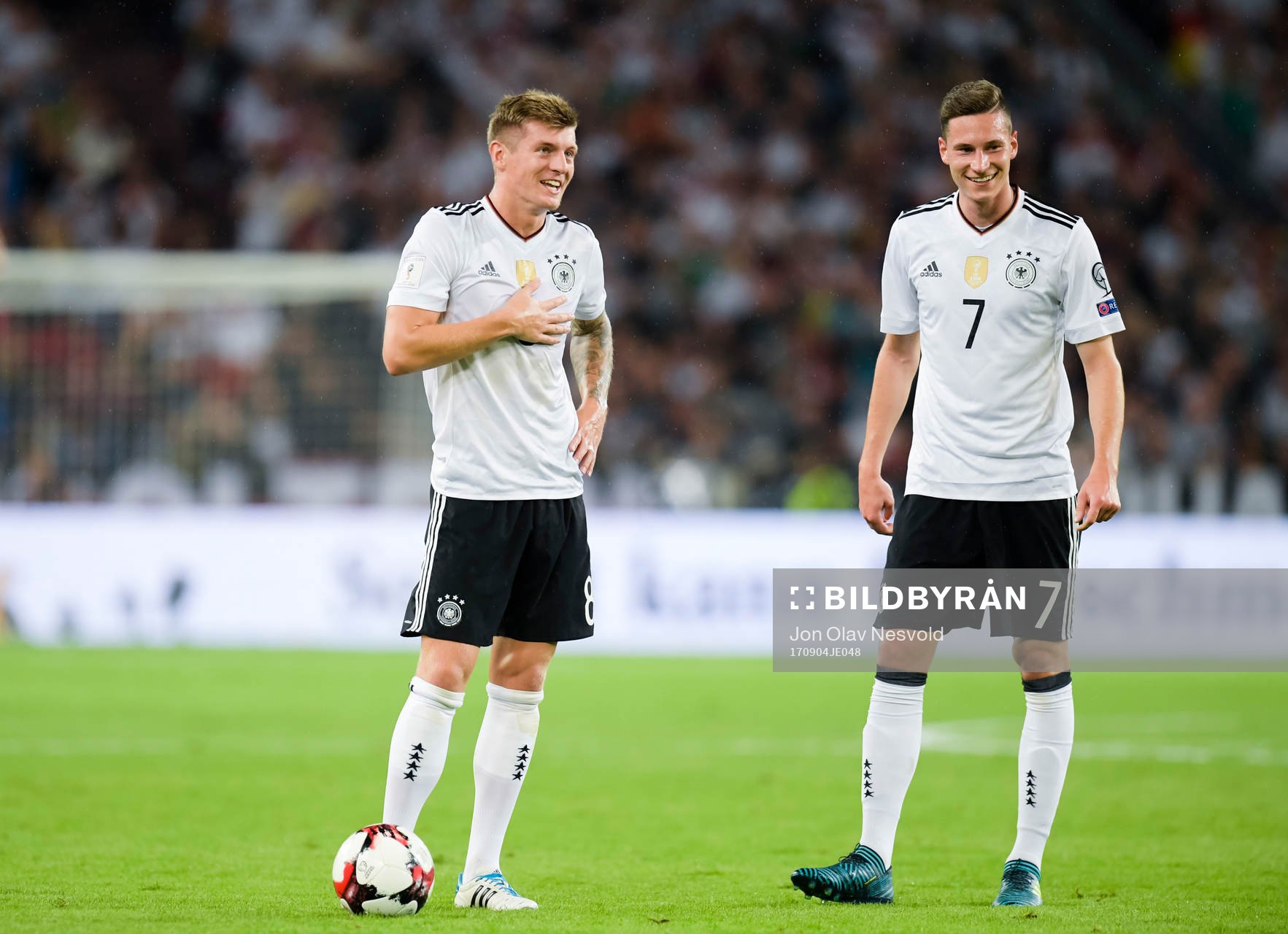 Toni Kroos and Julian Draxler of Germany