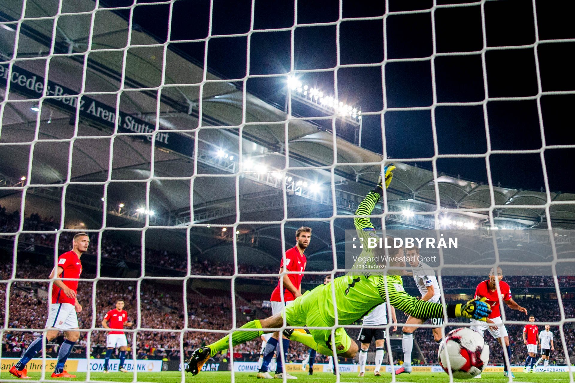 Leon Goretzka of Germany scores 5-0 behind goalkeeper Rune