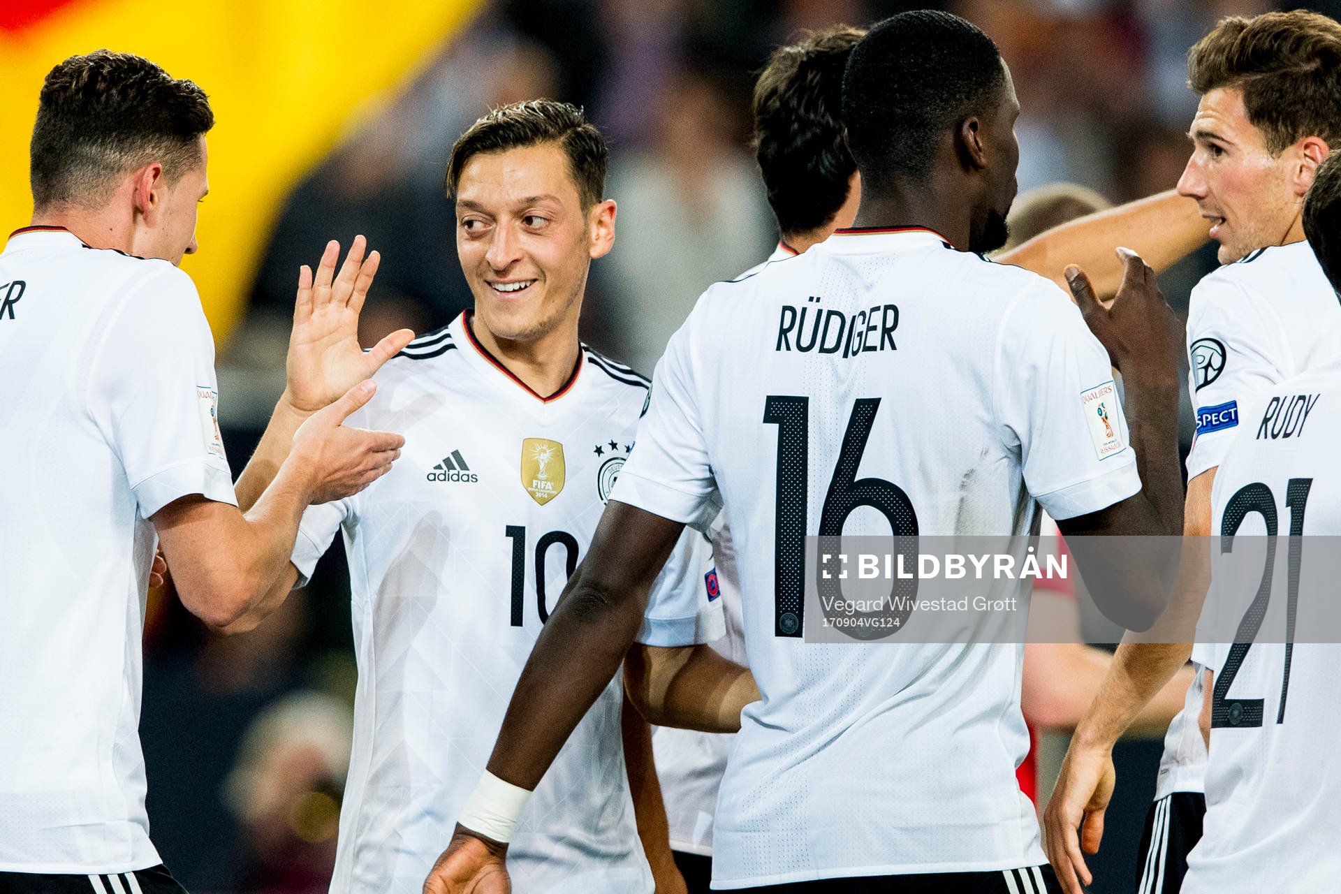 Mesut Özil celebrates with team mates