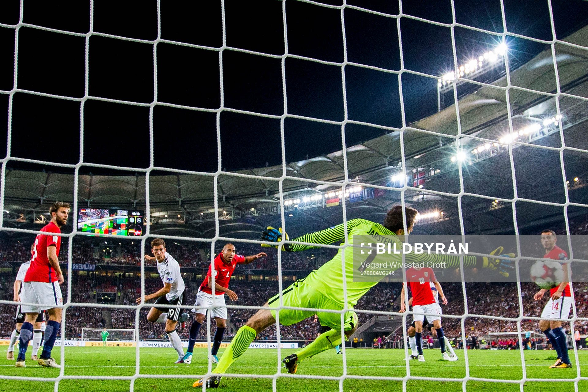 Leon Goretzka of Germany scores 5-0 behind goalkeeper Rune