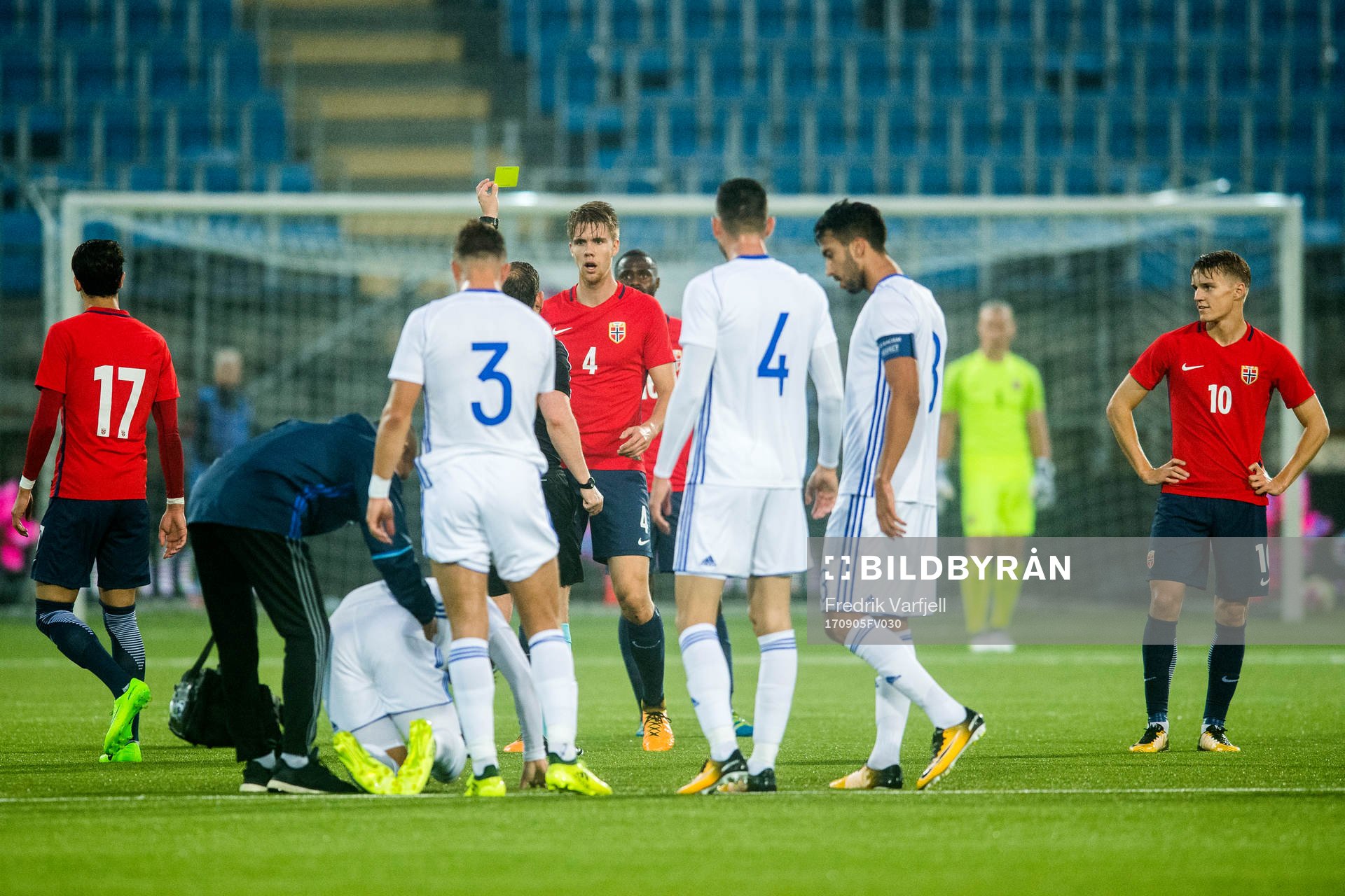 Kristoffer Ajer of Norway is shown a yellow card by referee