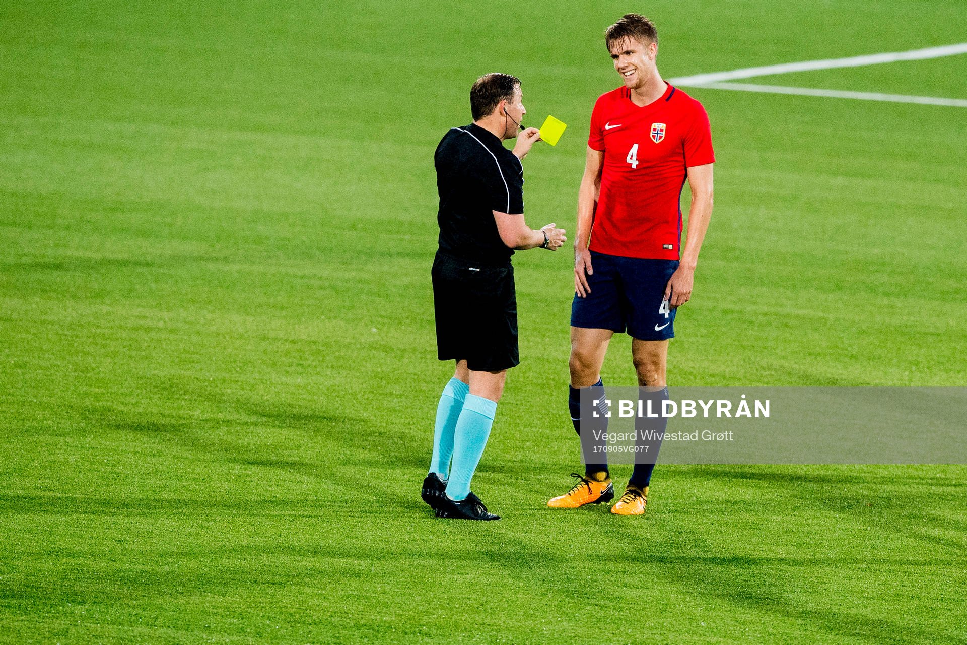 Kristoffer Ajer of Norway is shown a yellow card by referee