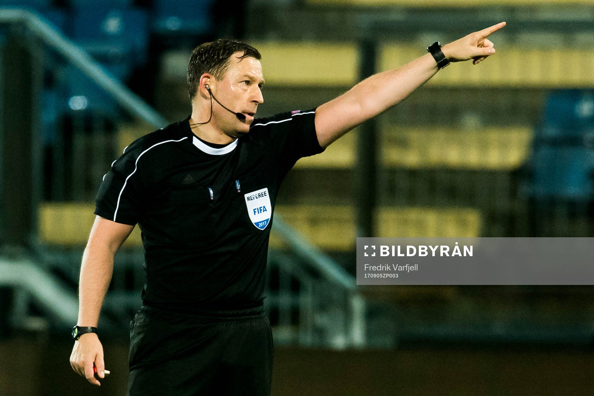 The referee Thoroddur Hjaltalin of Iceland