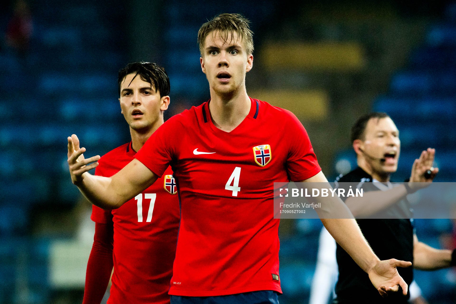 Rafik Zekhnini and Kristoffer Ajer of Norway react next to