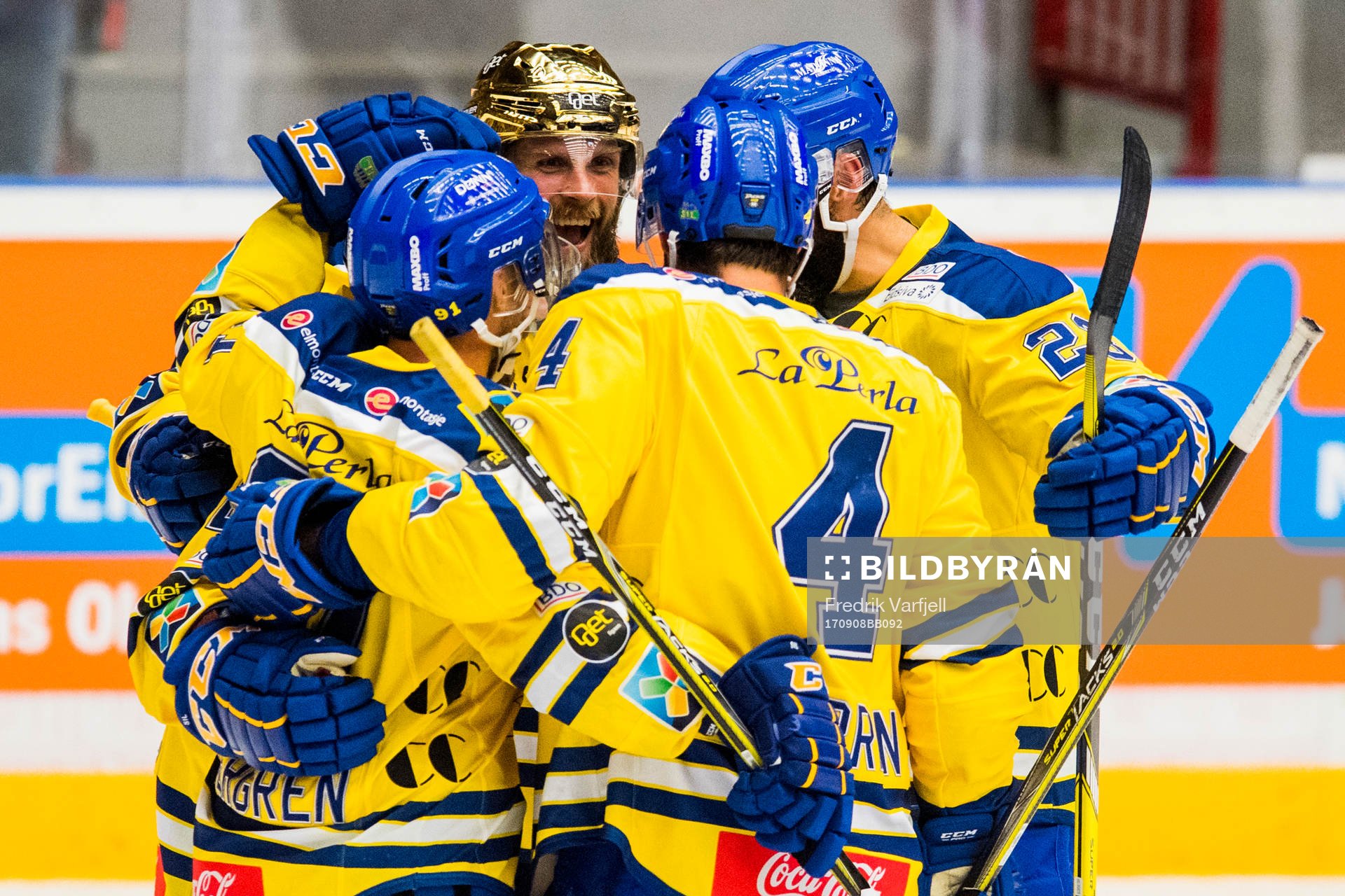 Joakim Jensen of Storhamar celebrates with his teammates