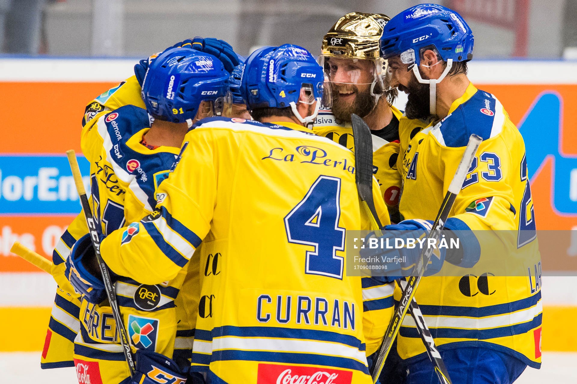 Joakim Jensen of Storhamar celebrates with his teammates