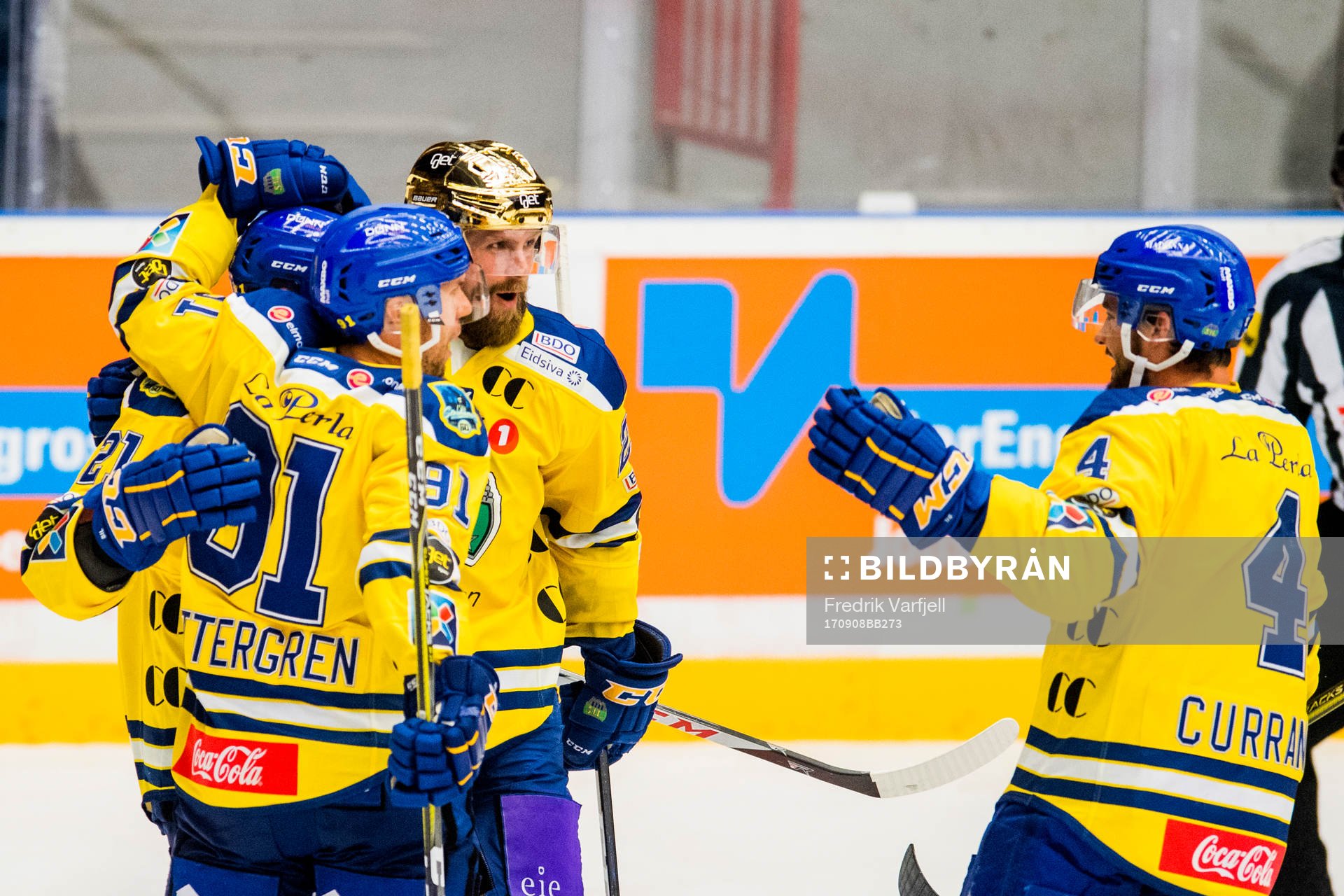 Joakim Jensen of Storhamar celebrates with his teammates