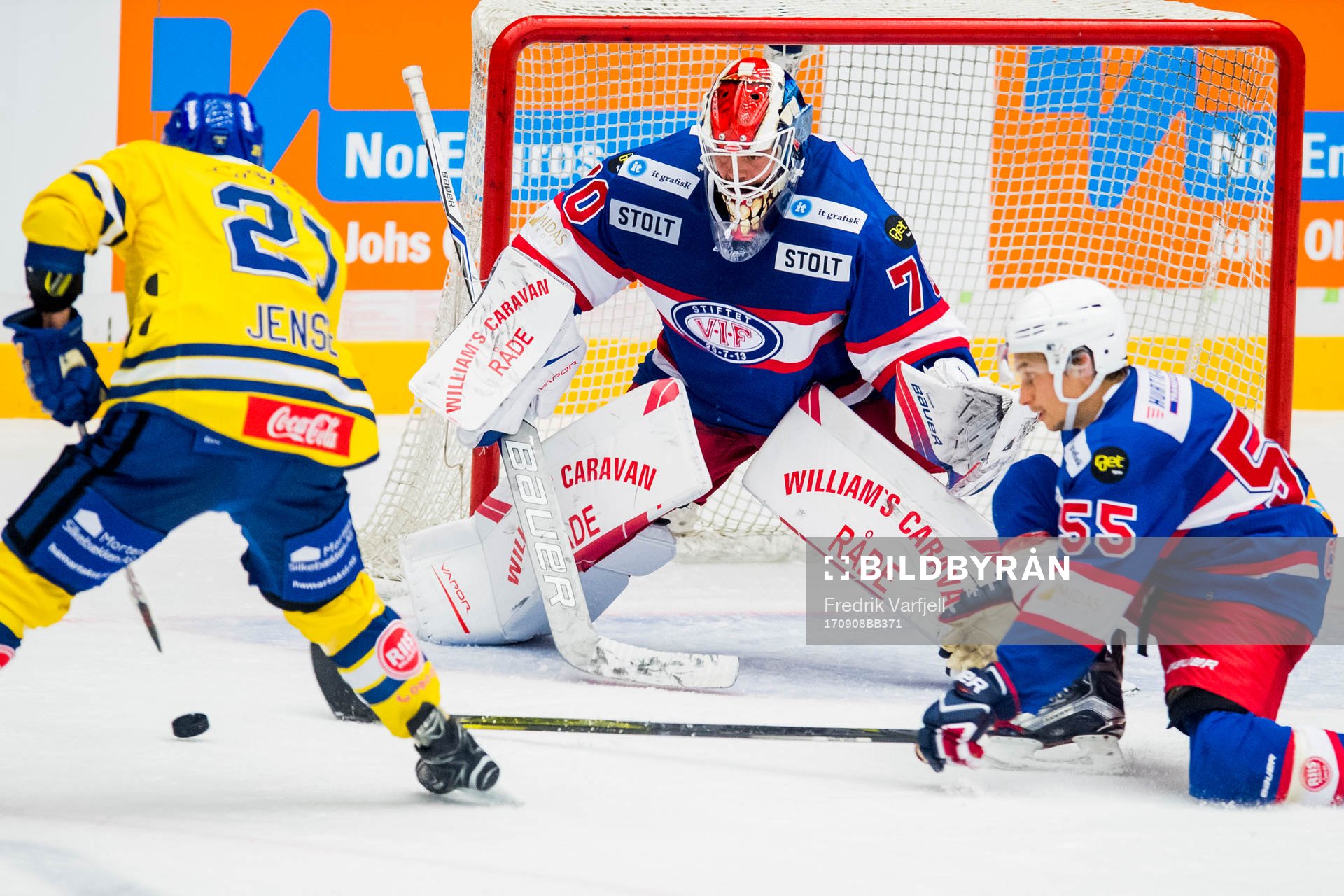 Joakim Jensen of Storhamar, goalkeeper Stefen Søberg and