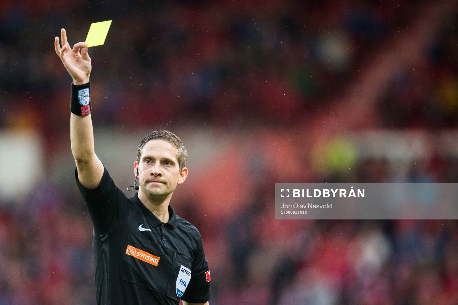 Espen Eskås, referee, awards a yellow card to Victor