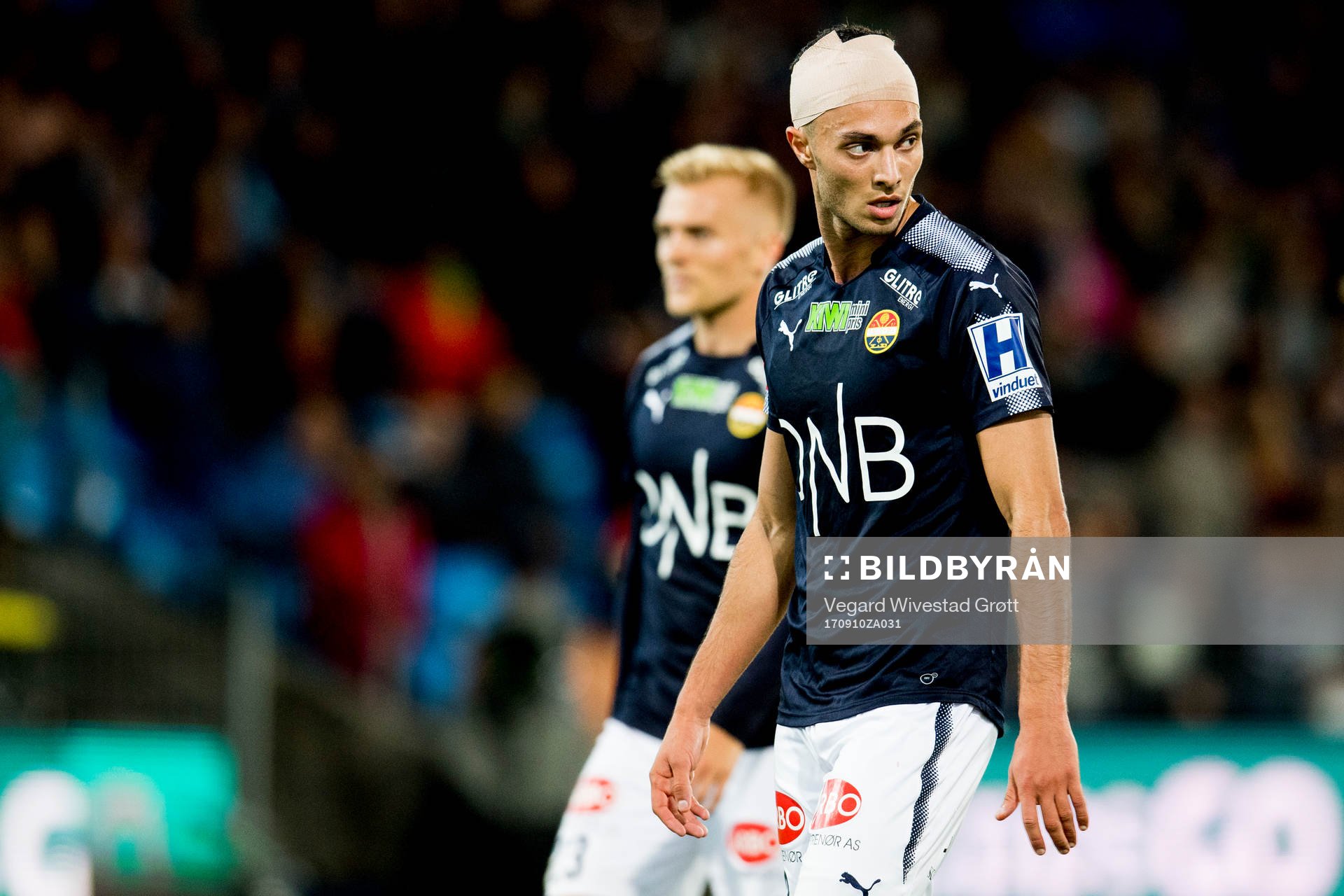 Bassel Jradi of Strømsgodset with a bandage around his head