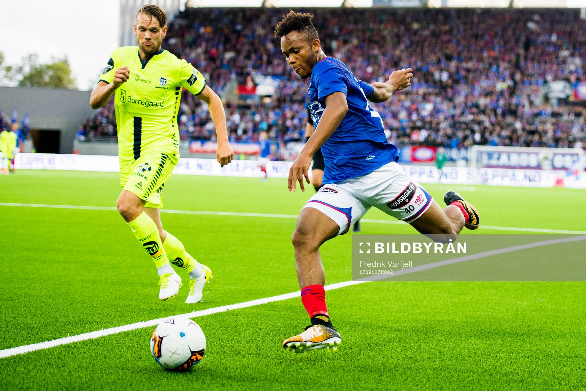 Ole Jørgen Halvorsen of Sarpsborg 08 and Chidera Ejuke of