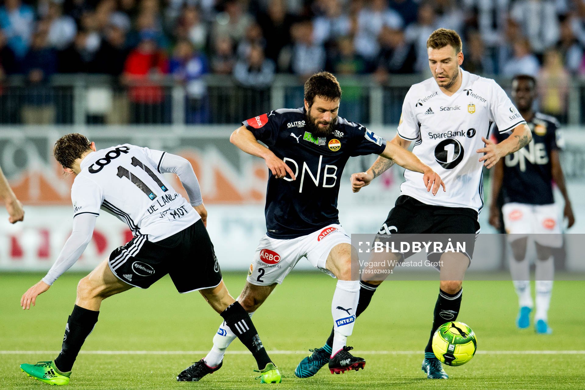 Mounir Hamoud of Strømsgodset in action against Yann-Erik