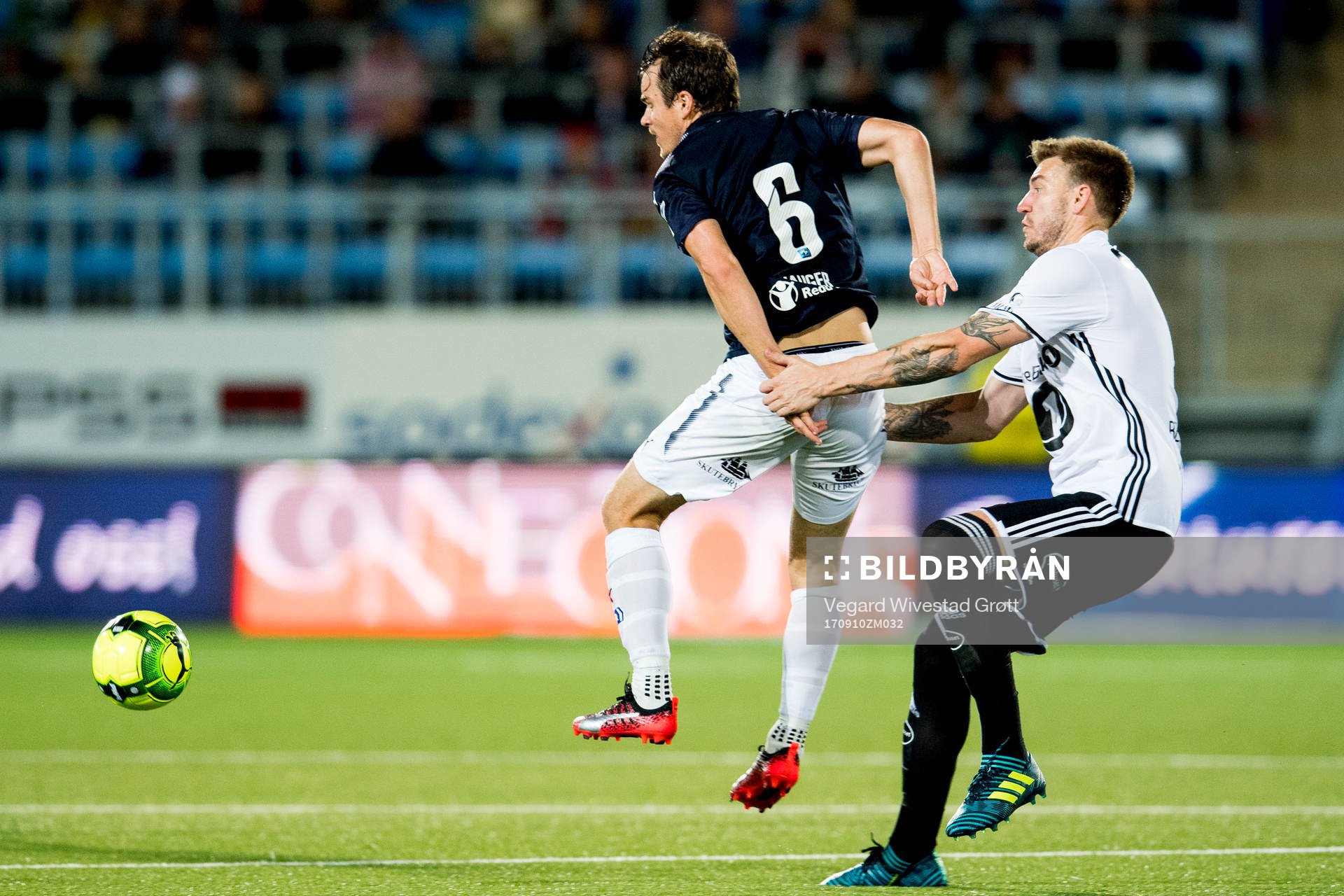 Henning Hauger of Strømsgodset and Nicklas Bendtner of