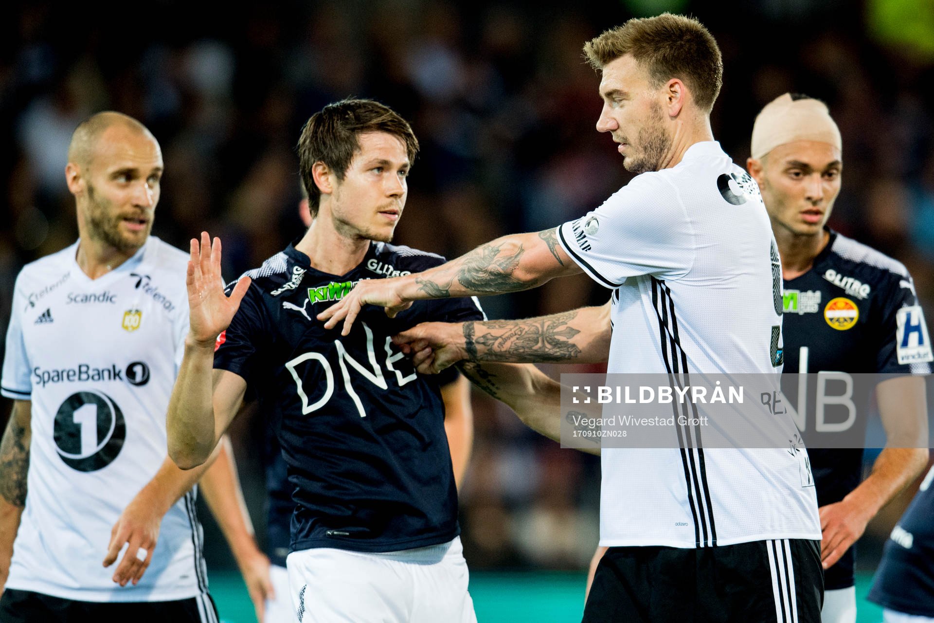 Nicklas Bendtner of Rosenborg gives Lars Vilsvik of