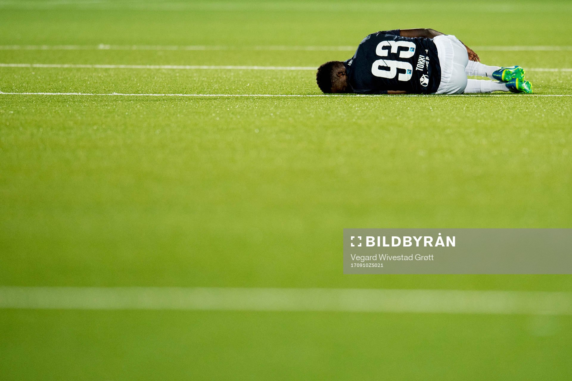 Tokmac Nguen of Strømsgodset lies down