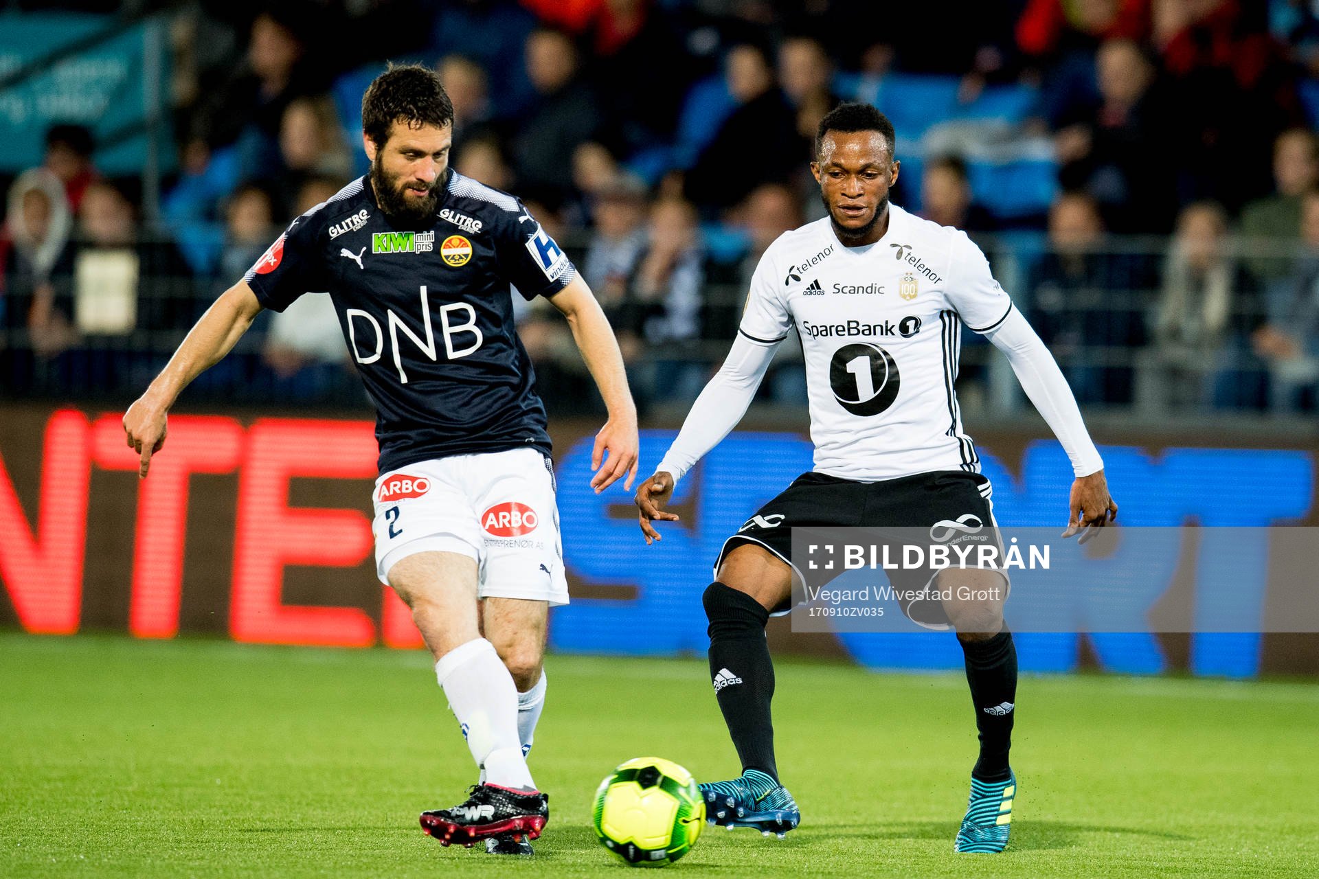 Mounir Hamoud of Strømsgodset and Samuel Adegbenro of