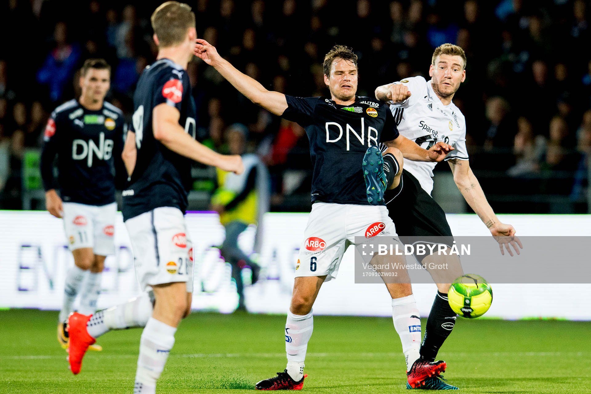 Henning Hauger of Strømsgodset and Nicklas Bendtner of