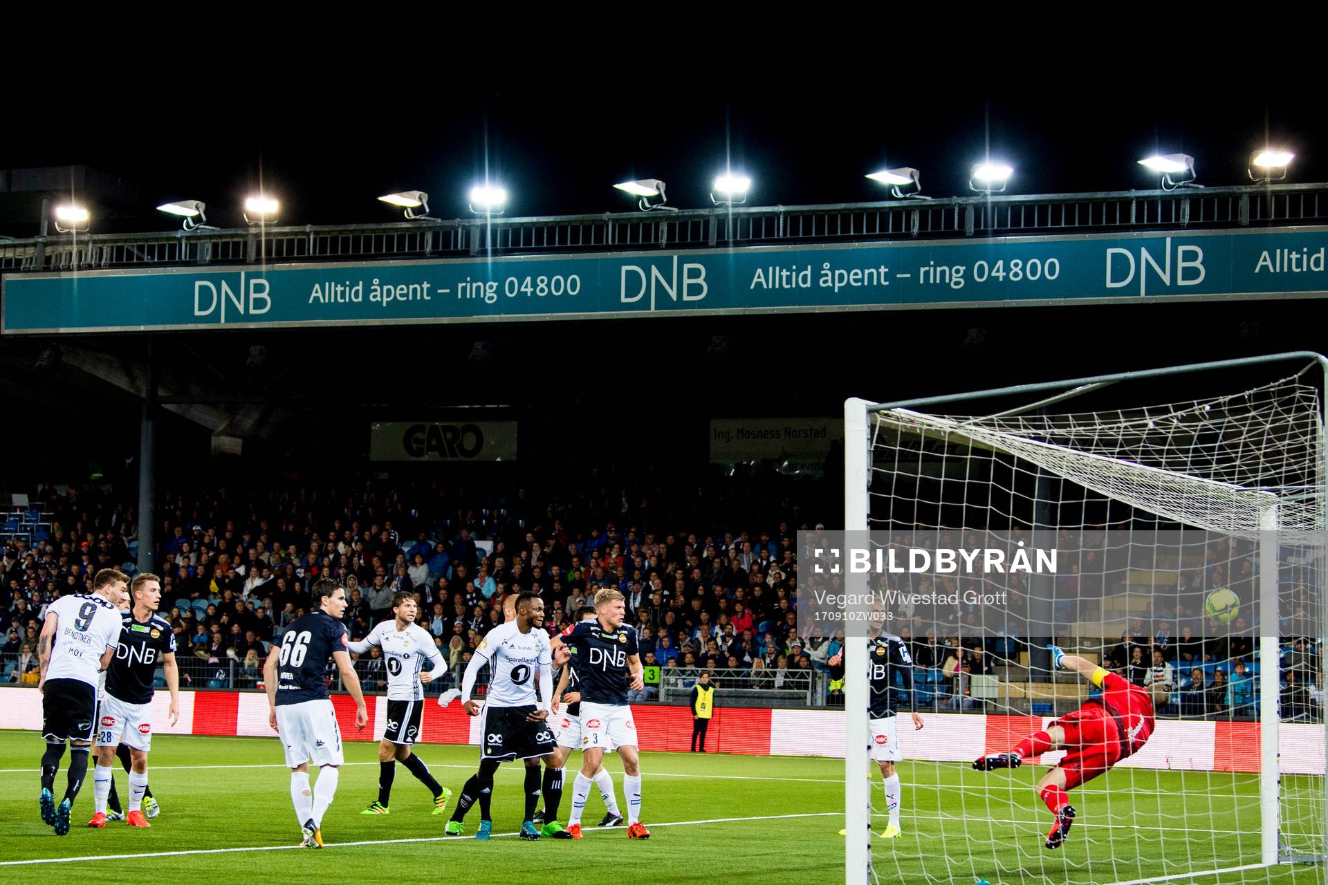 Nicklas Bendtner of Rosenborg scores 0-1 behind goalkeeper