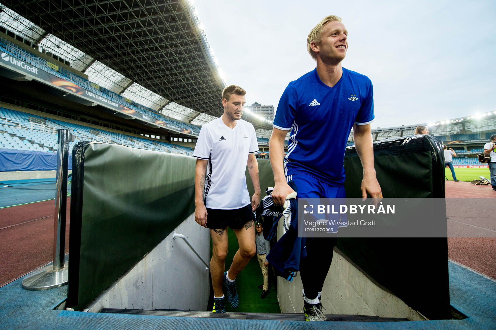 Nicklas Bendtner and goalkeeper Arild Østbø of Rosenborg