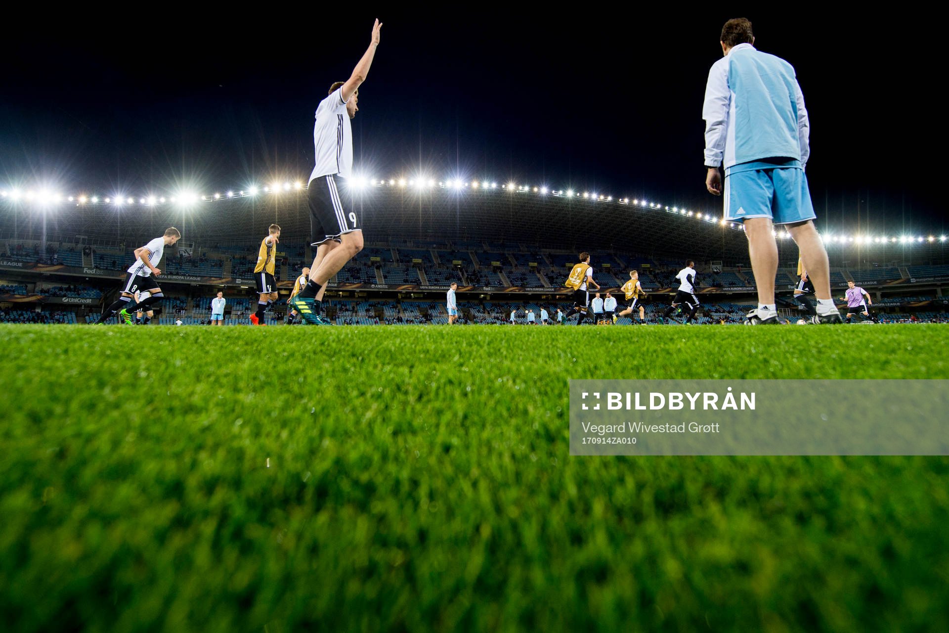 Players of Rosenborg warm up ahead of the UEFA Europa