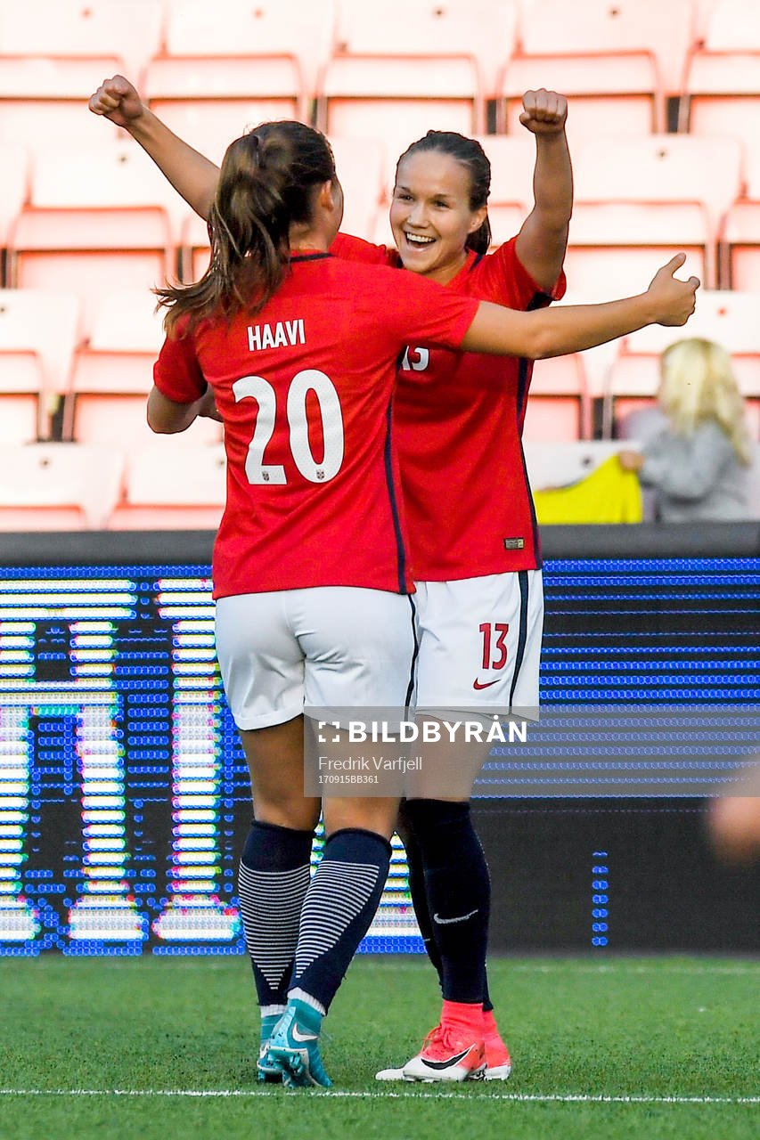 Guro Reiten of Norway celebrates with her teammate Emilie