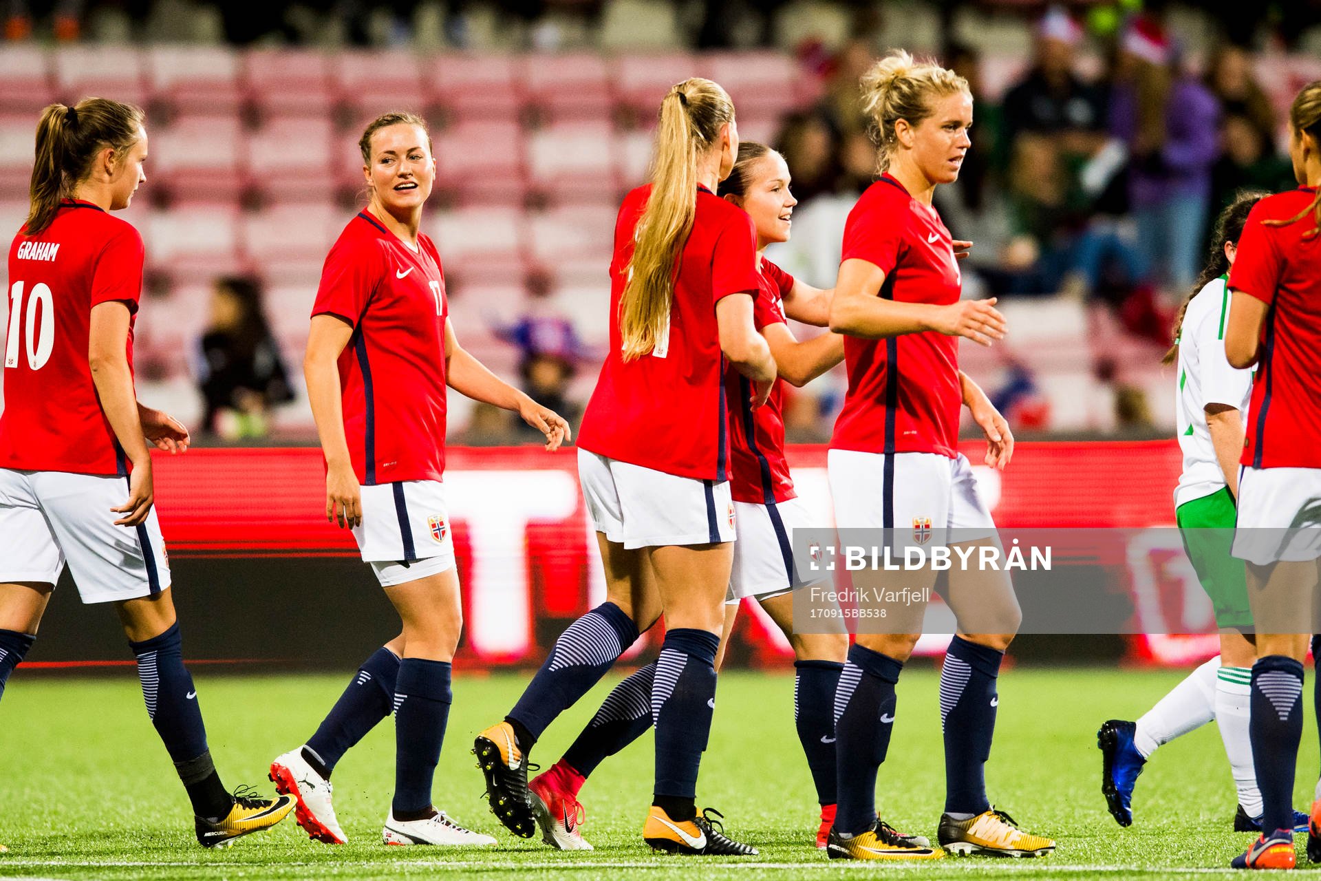 Guro Reiten of Norway celebrates with her teammates