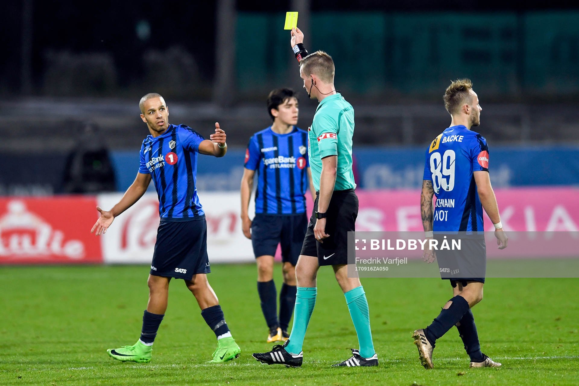 Ahmed el Amarani of Stabæk is shown a yellow card