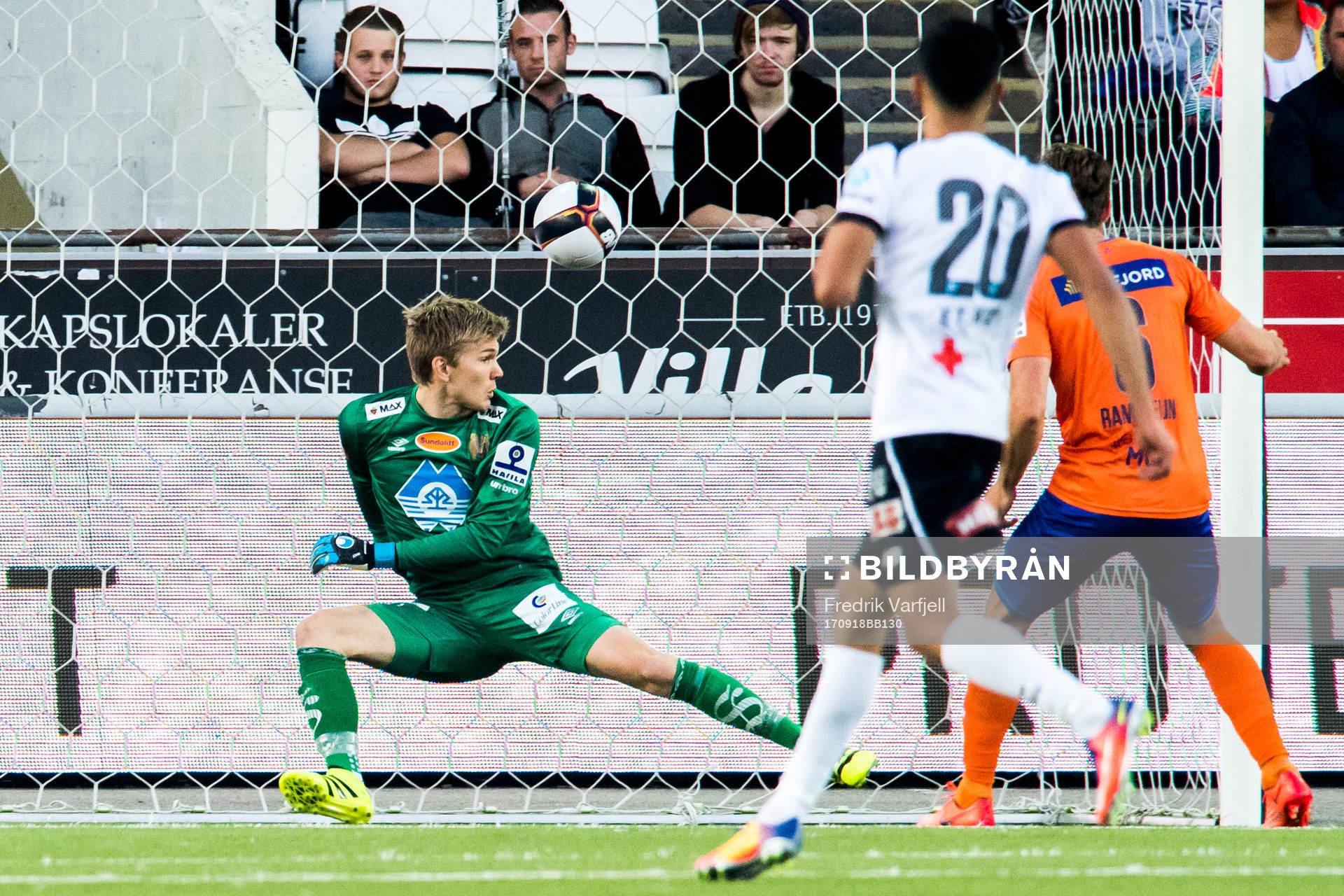 Goalkeeper Andreas Lie of Aalesund see the ball pass for 2-0