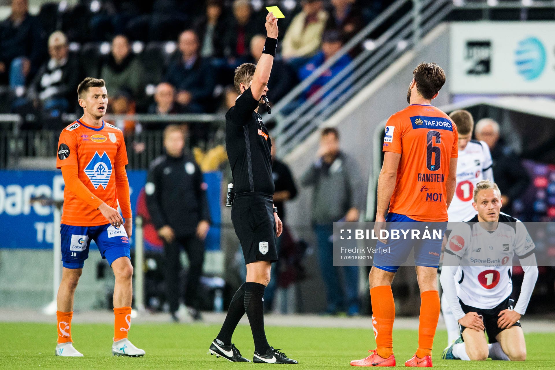 Kaj Ramsteijn of Aalesund is shown a yellow card by The