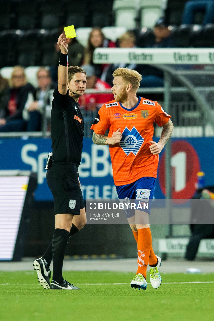 Fredrik Kjernmoen Carlsen of Aalesund is shown a yellow