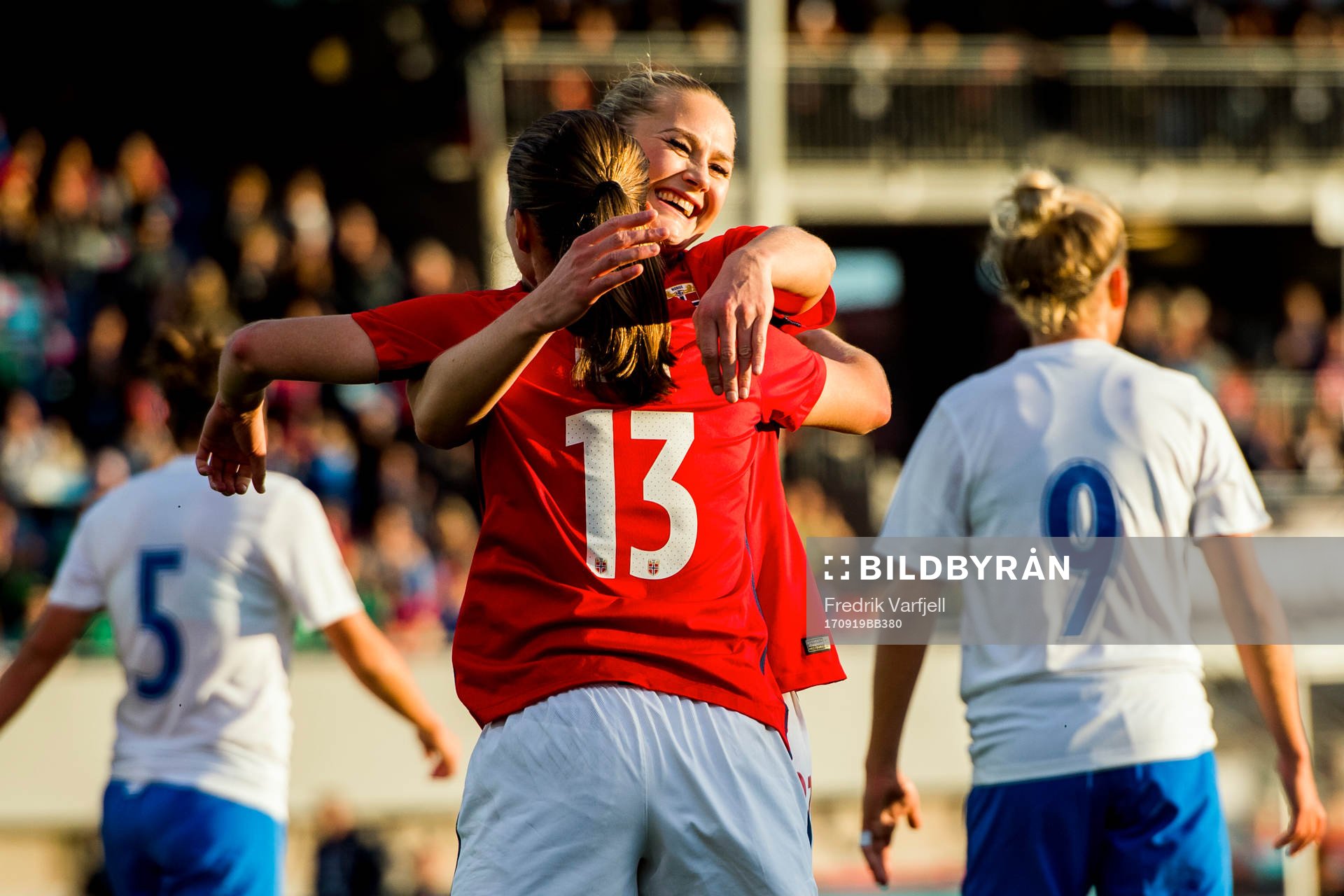 Guro Reiten of Norway celebrates with her teammate