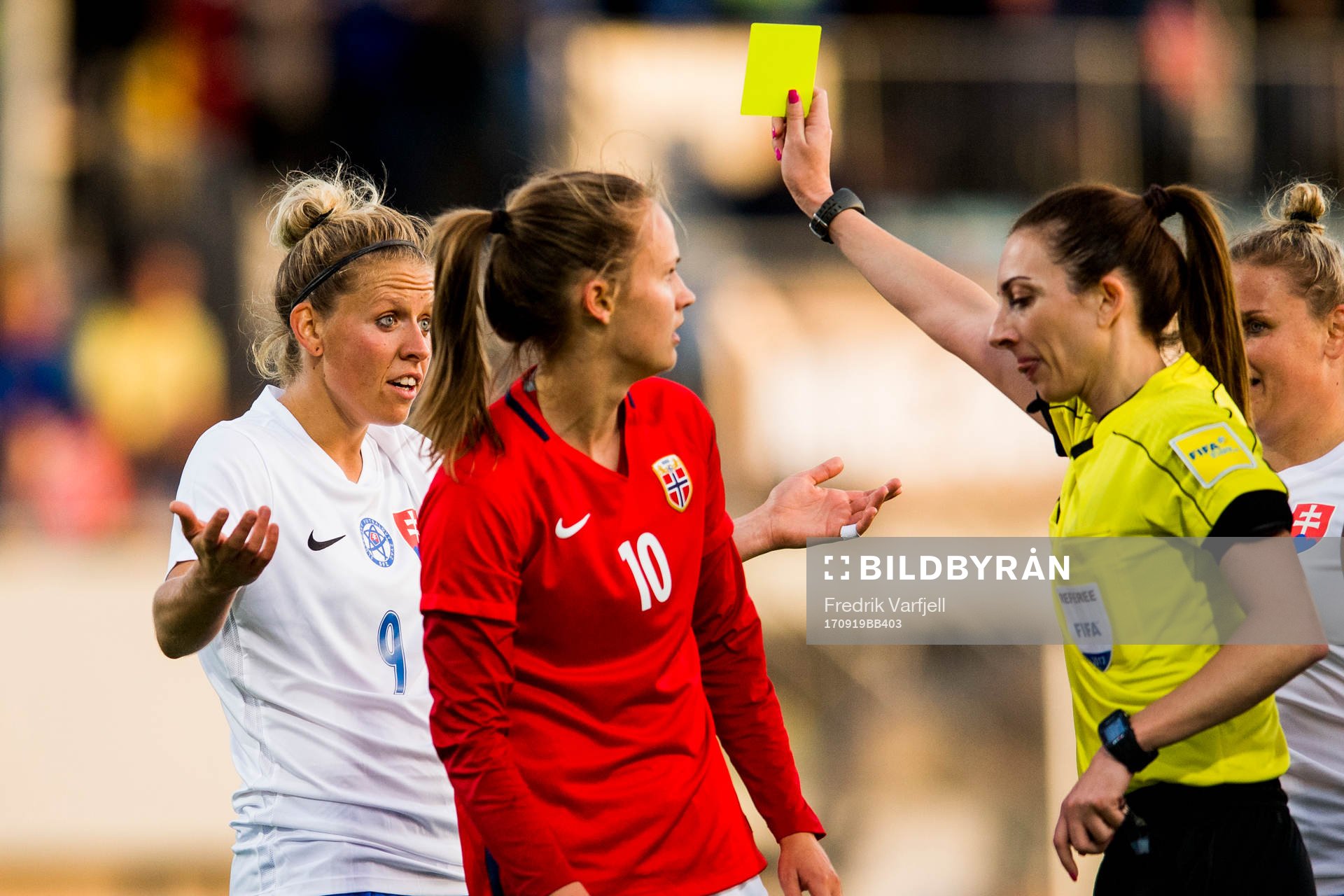 Jana Vojtekova of Slovakia is shown a yellow card by The