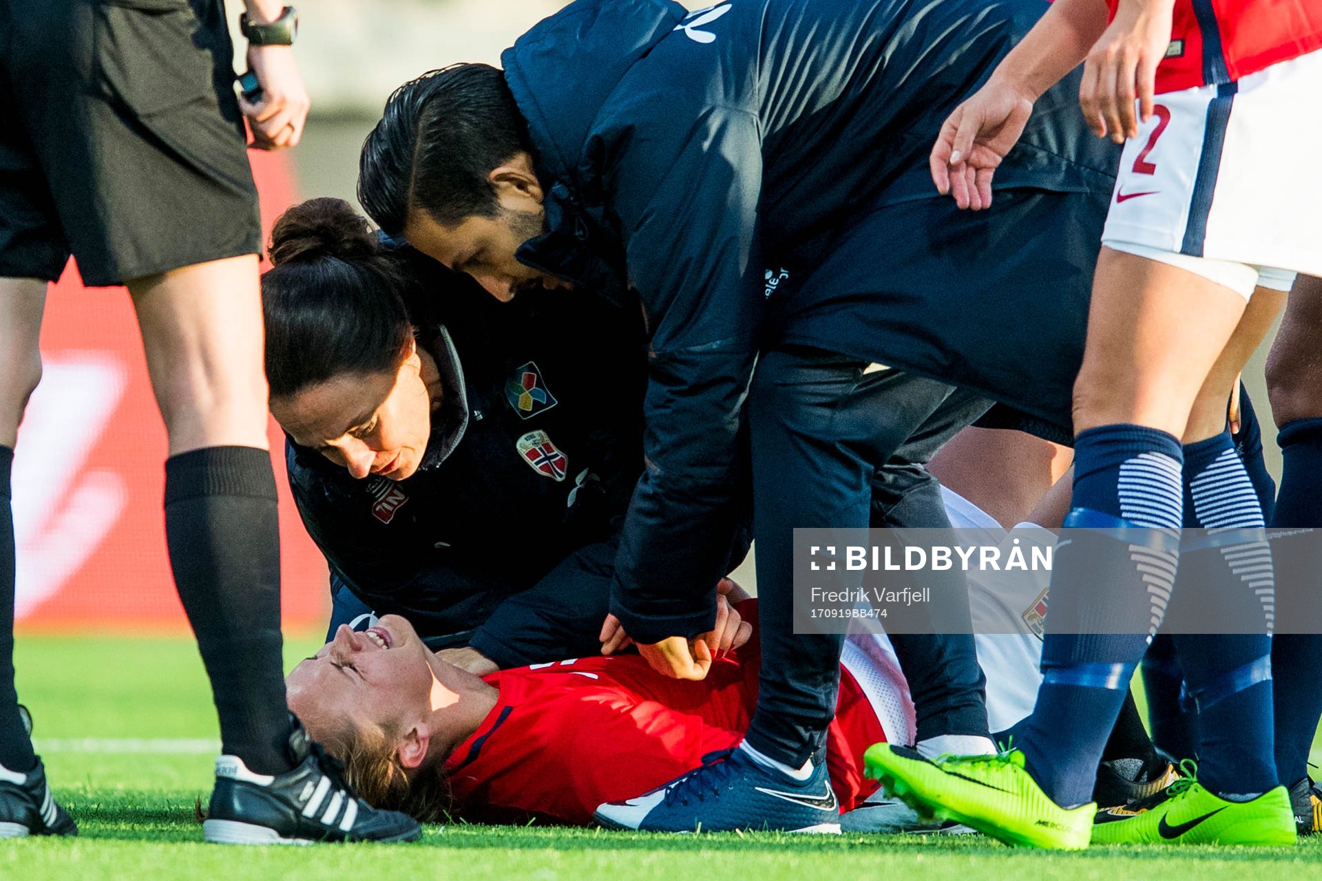 Caroline Graham Hansen of Norway receives treatment for an
