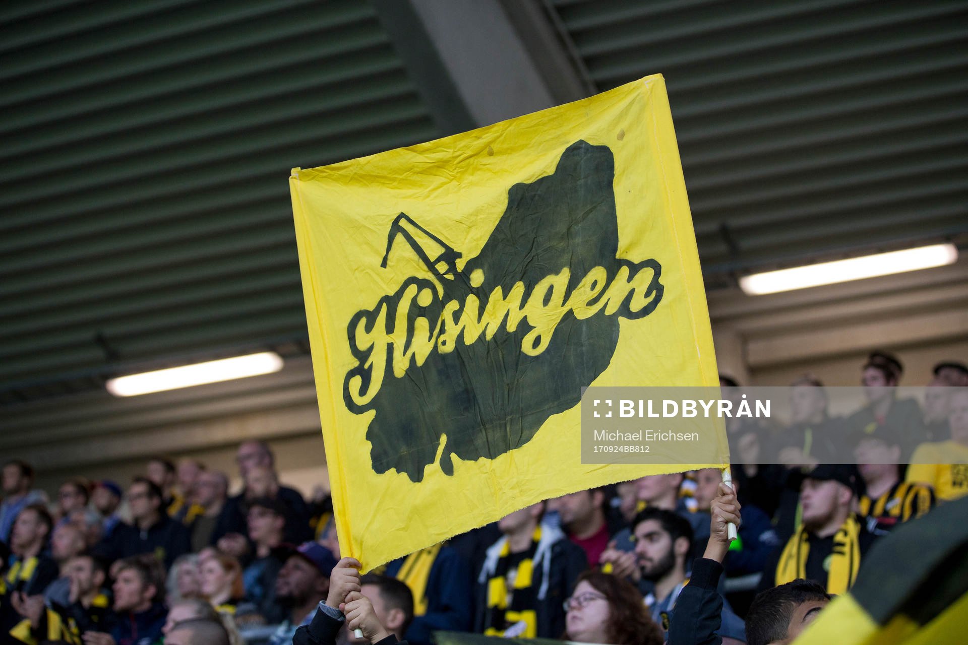 Häckens klack med en flagga