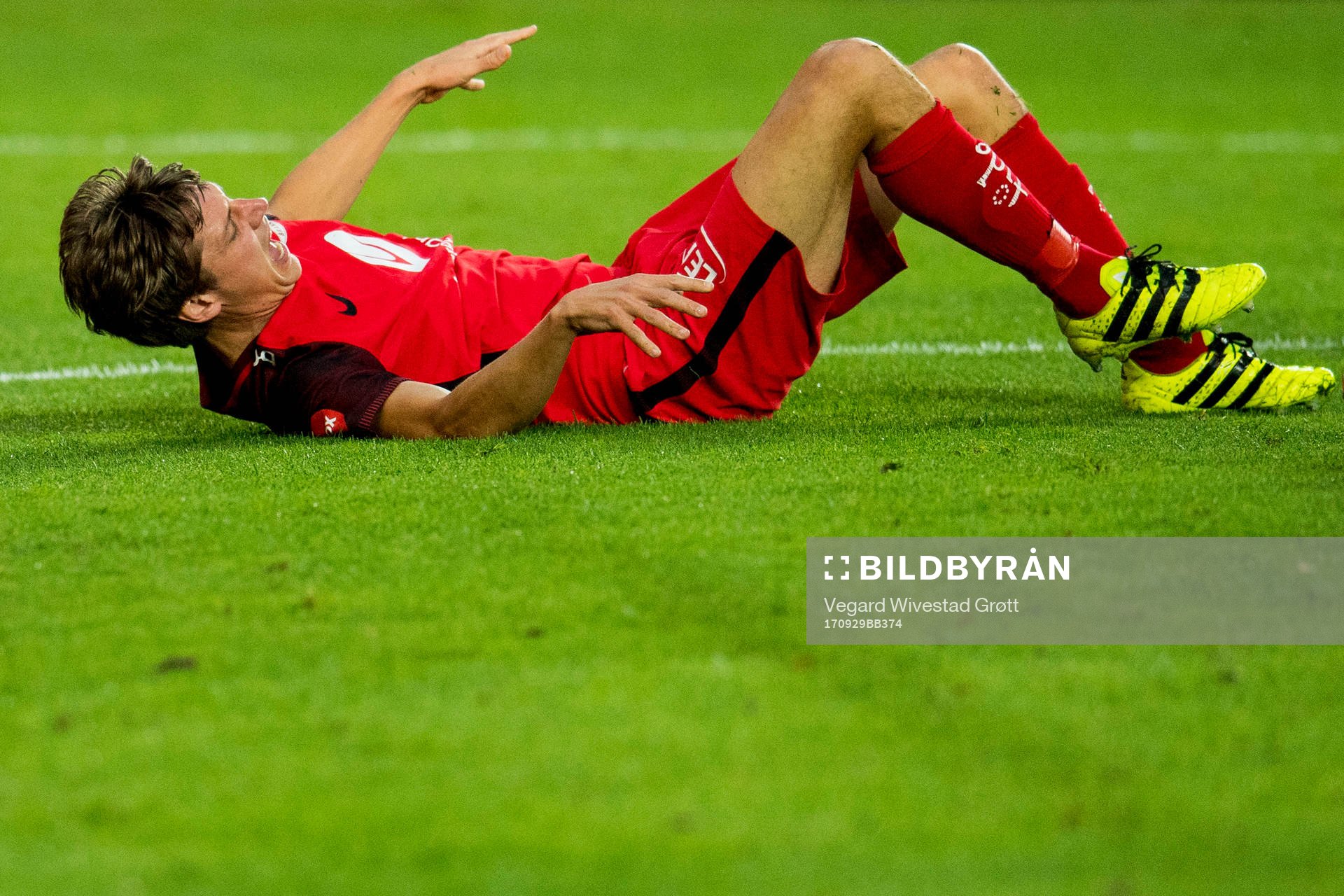 Jakob Orlov of Brann lies down with an injury during the Eliteserien match between Brann and Kristiansund on September 29, 2017 in Bergen.