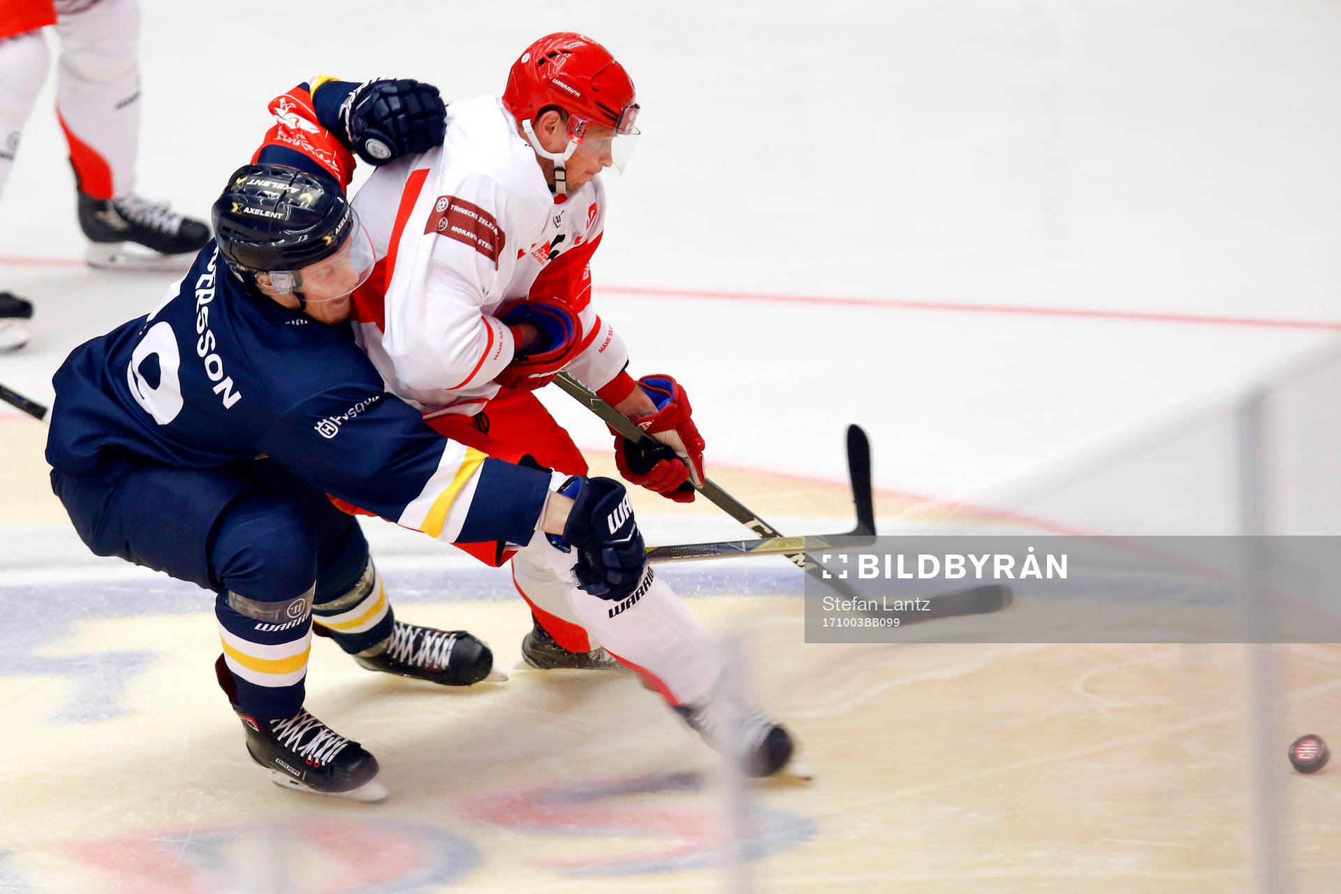 Erik Andersson of HV71 and Daniel Rakos of Ocelari Trinec