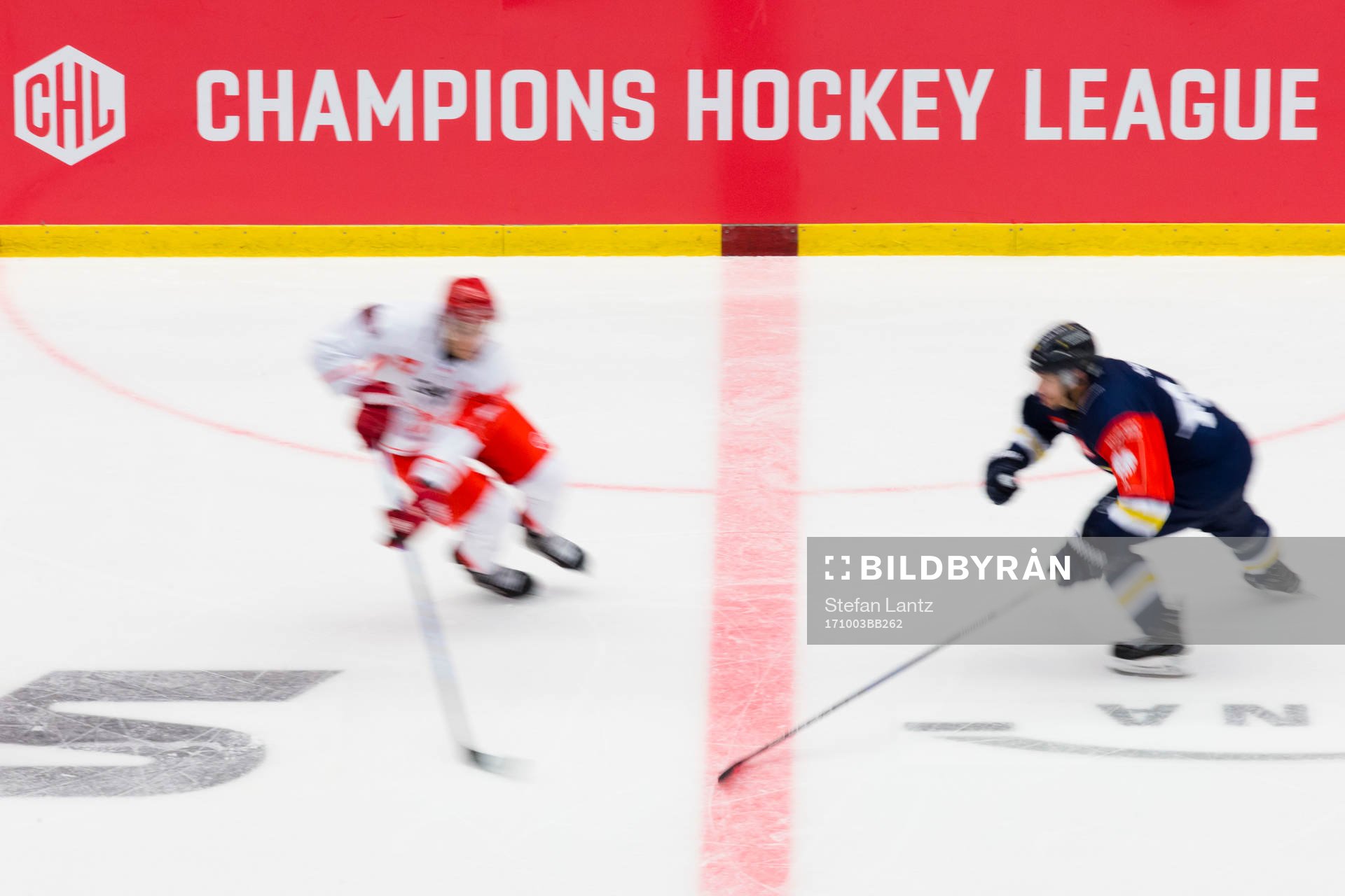 Players in front of the CHL logo