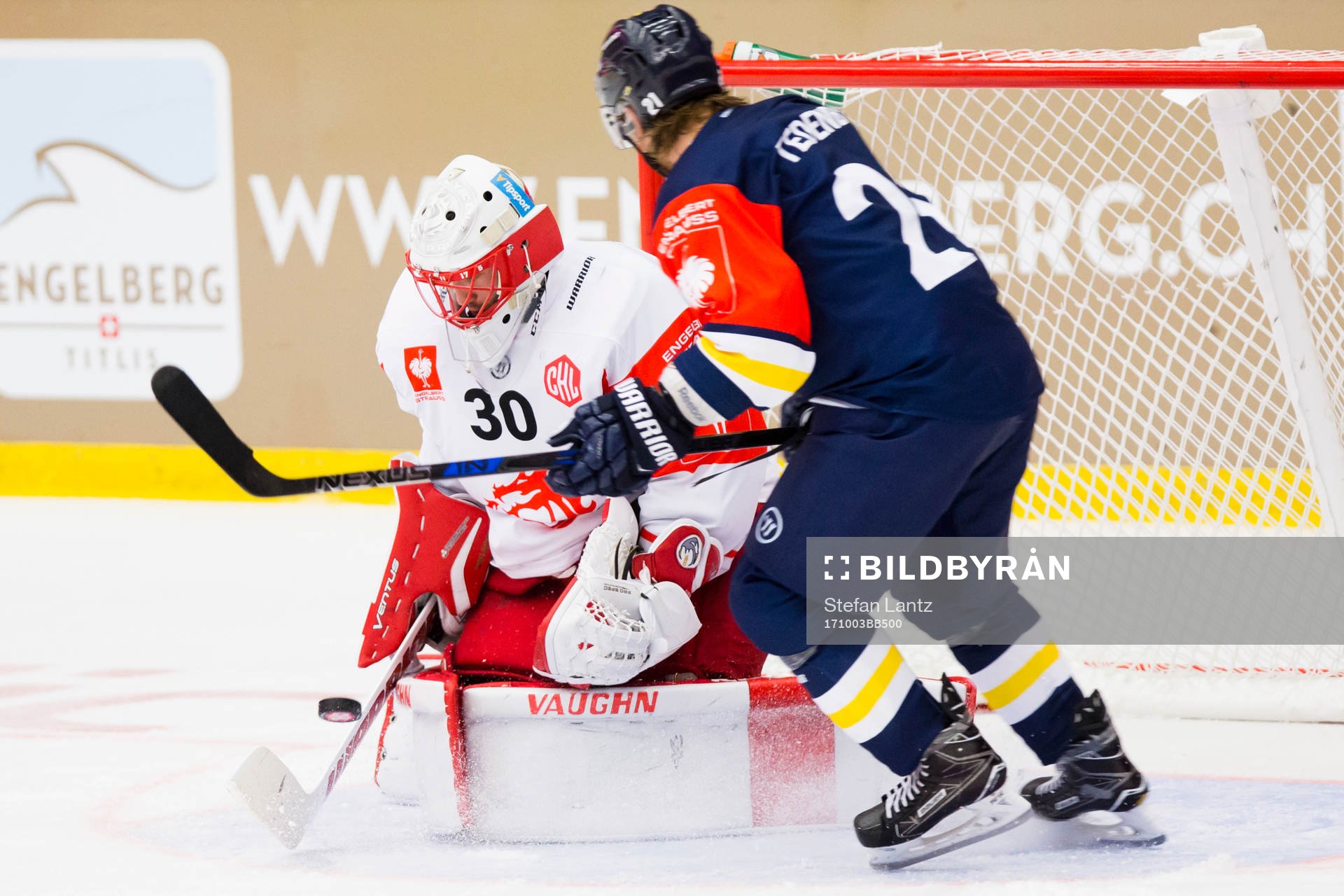 Simon Hrubec of Ocelari Trinec saves in front of Mattias