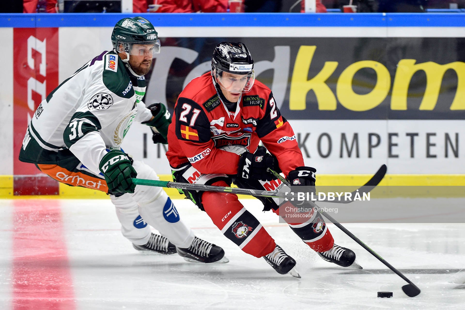 Färjestads Dick Axelsson och Malmö Redhawks Andy Miele