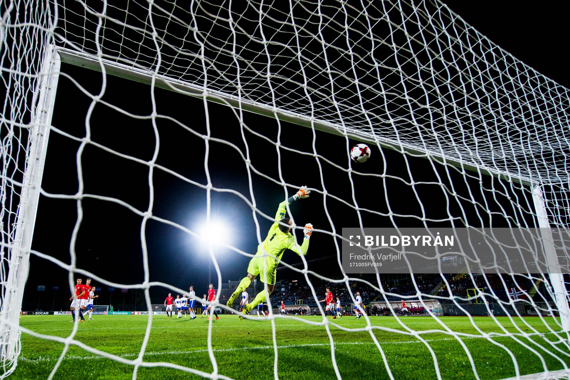 Ole Kristian Selnæs of Norway scores 6-0 behind goalkeeper