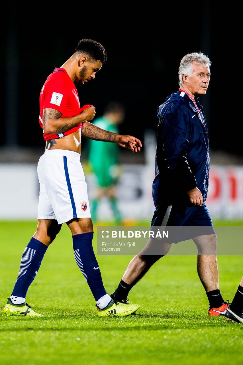 Joshua King of Norway walks off the pitch with an injury