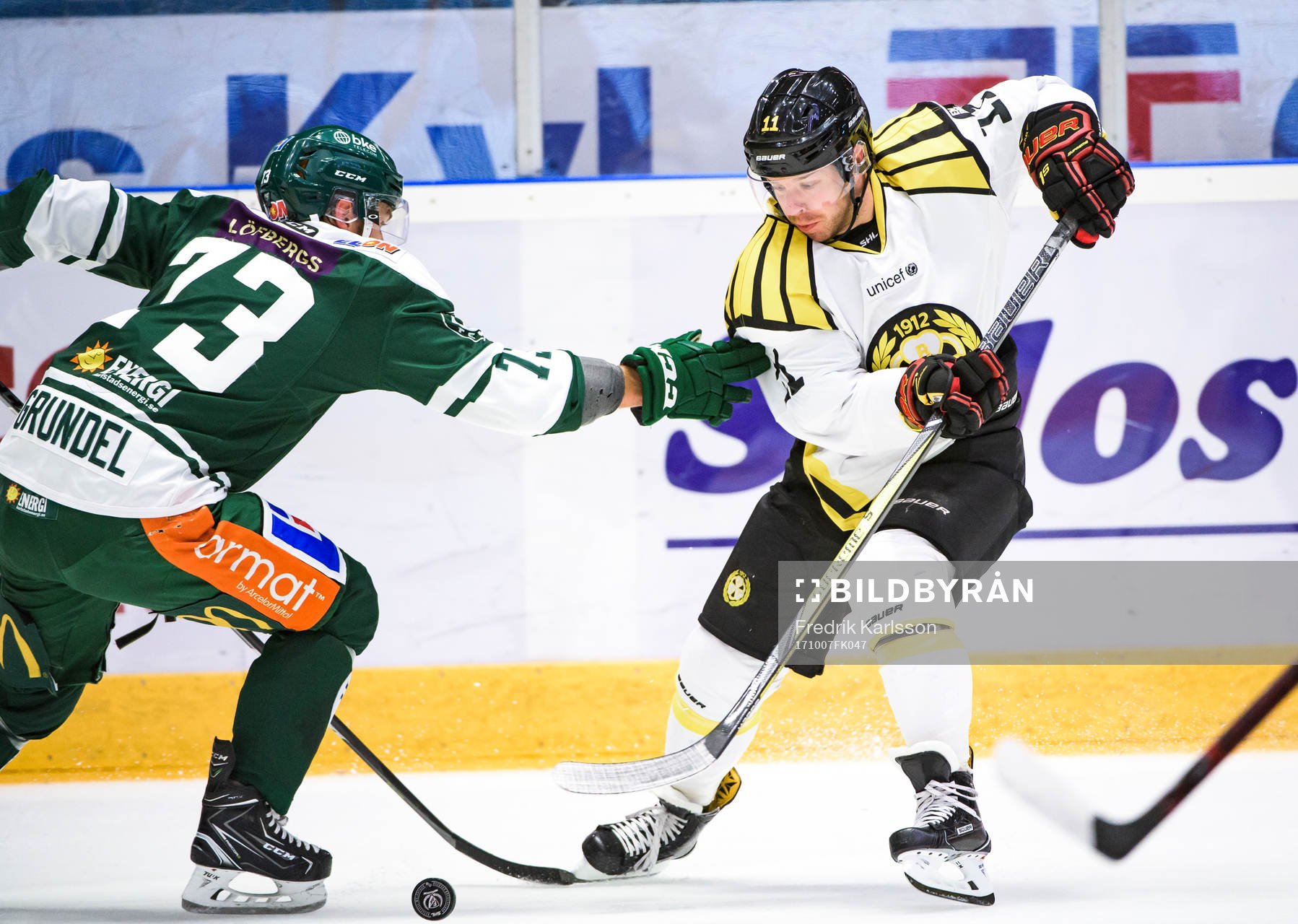 Färjestads Anton Grundel och Brynäs Kevin Clark
