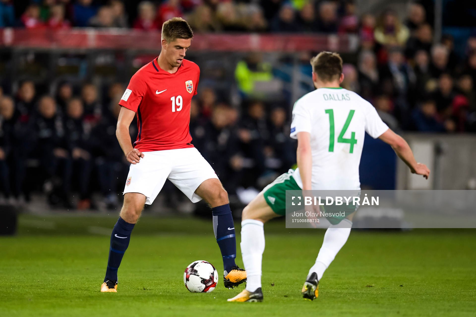 Markus Henriksen of Norway and Stuart Dallas of Northern