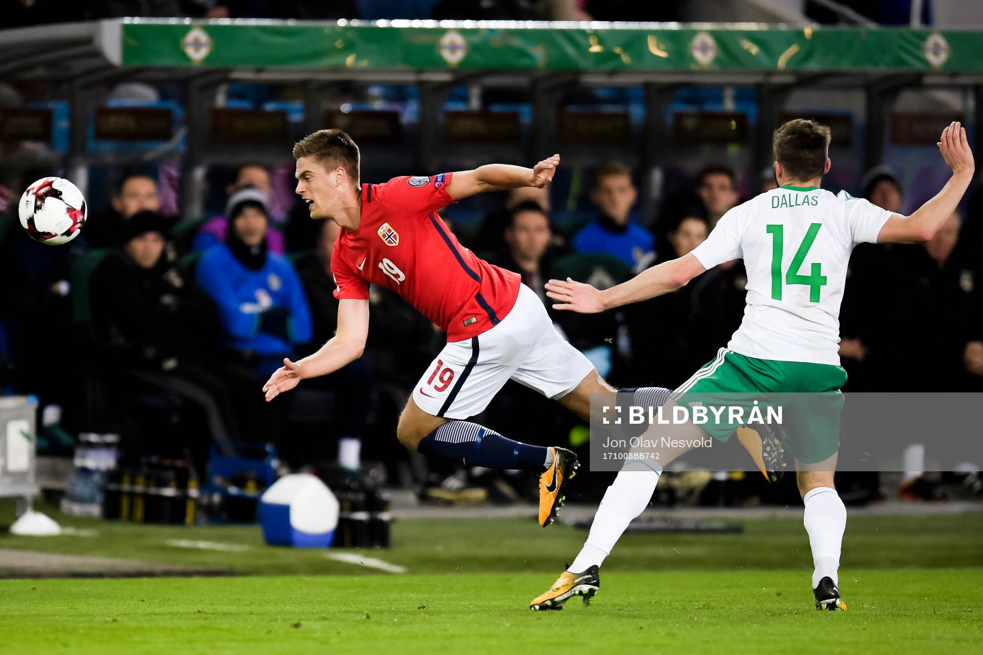 Markus Henriksen of Norway and Stuart Dallas of Northern