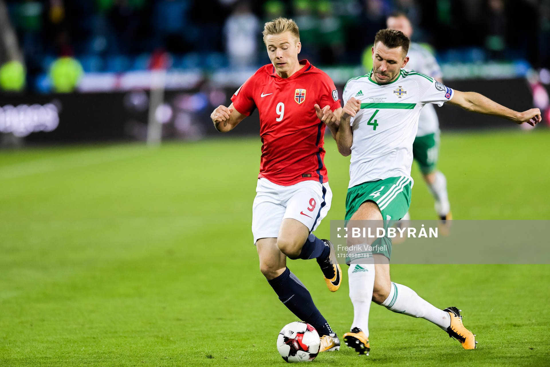Alexander Toft Søderlund of Norway and Gareth McAuley of