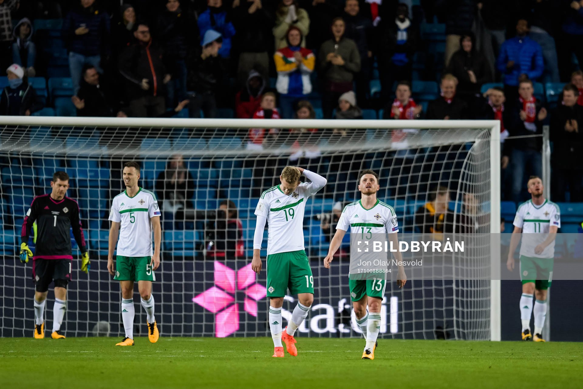 Players of Northern Ireland look dejected