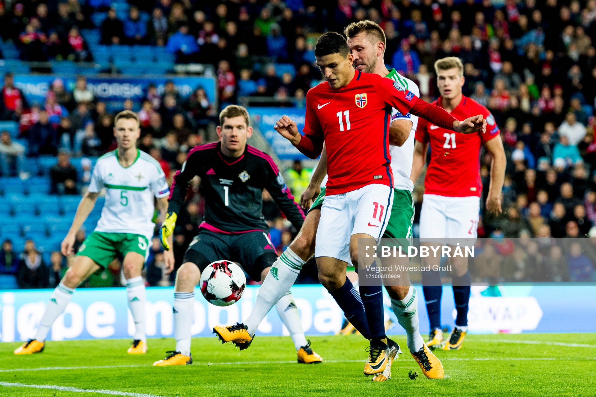 Mohamed Moi Elyounoussi of Norway and Gareth McAuley of